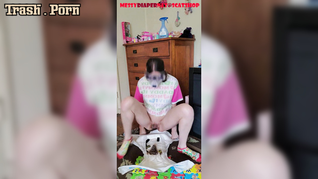 MessyDiaperNat pooped in her diaper and started looking at it