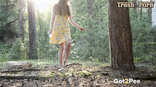 Brunette peed near the abandoned house, outdoor solo