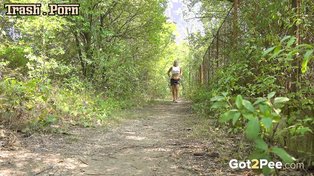 Blonde took off her shorts and peed on a forest path