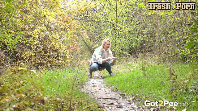 Quick pee in the woods before work (she always does it)