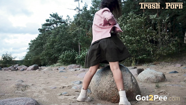 Urinating on a picturesque beach (hot solo scenes)