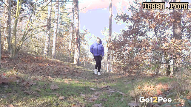 Peeing after picking mushrooms in the autumn forest