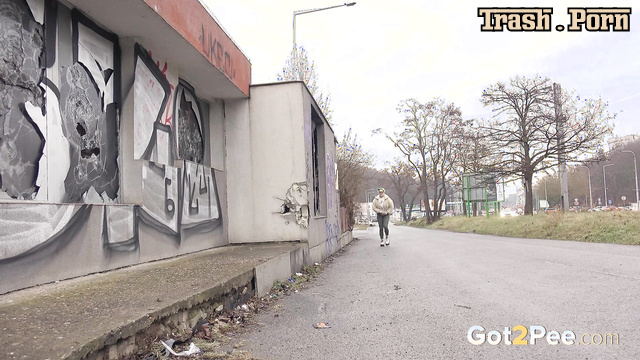 Public pee next to an abandoned store (she couldn't wait)