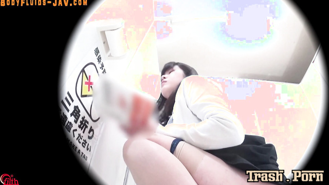 Cute asian girl pooped and then pissed on her shit