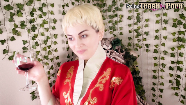 Blonde sitting on the toilet and drinking red wine - ellieidol1