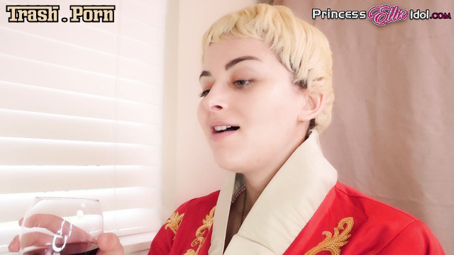 Blonde sitting on the toilet and drinking red wine - ellieidol1