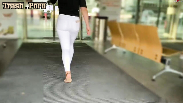Pretty SteffiBlond walking around the airport and peeing