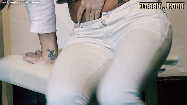 Her pussy wants to pee right in her white sexy jeans