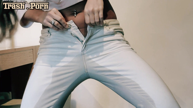 Her pussy wants to pee right in her white sexy jeans