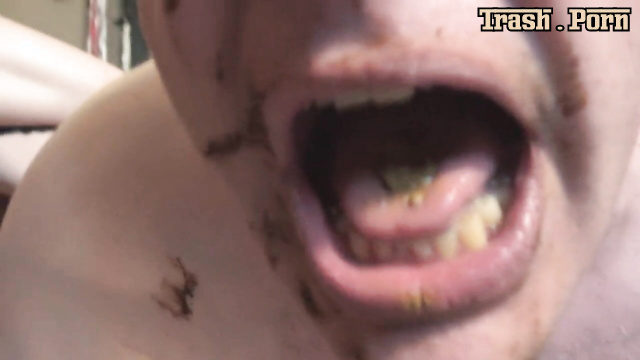 She spat on the shit in his mouth and then he ate it