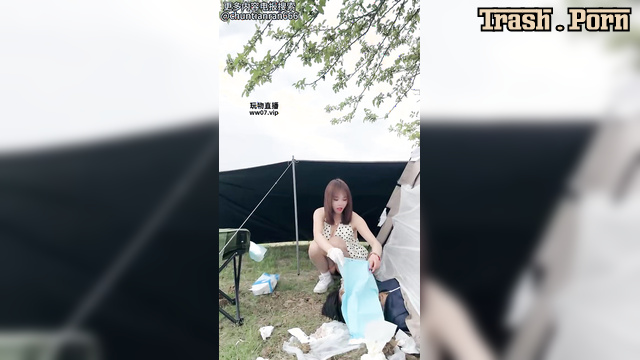 Asian babe smearing shit all over his face near the tent, Mistress Mico