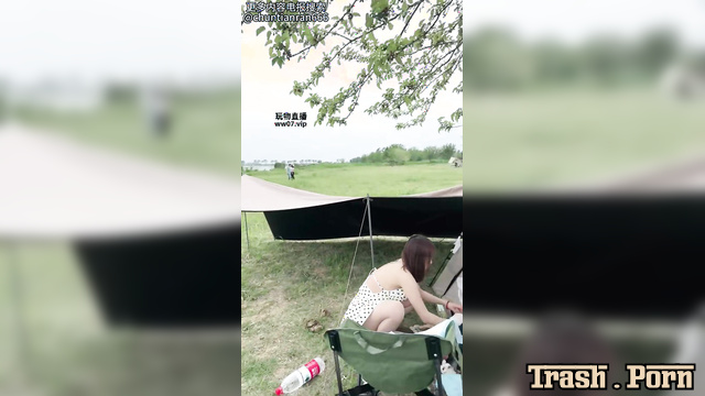 Asian babe smearing shit all over his face near the tent, Mistress Mico